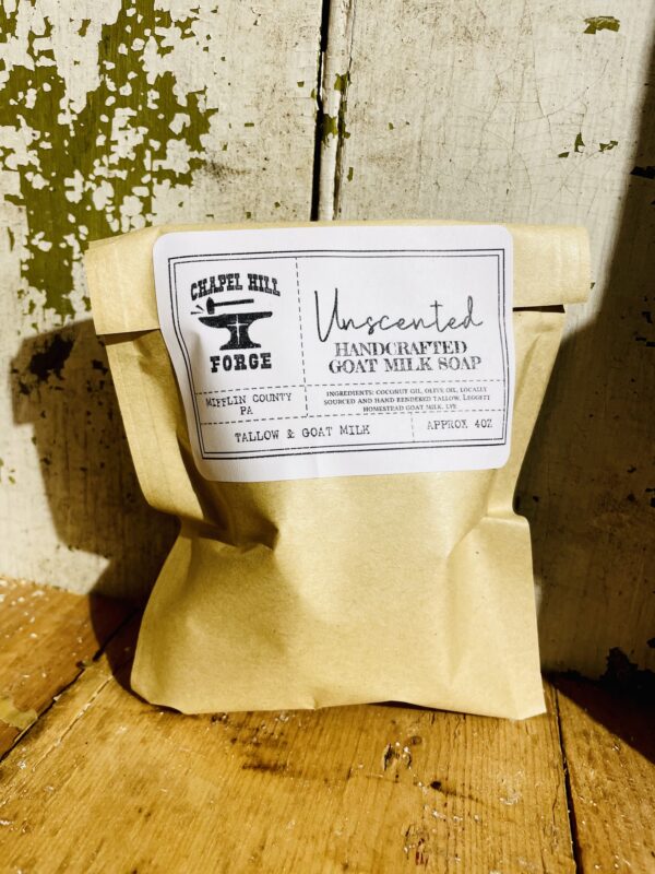 A bar of unscented eczema soap made with goat milk and tallow.