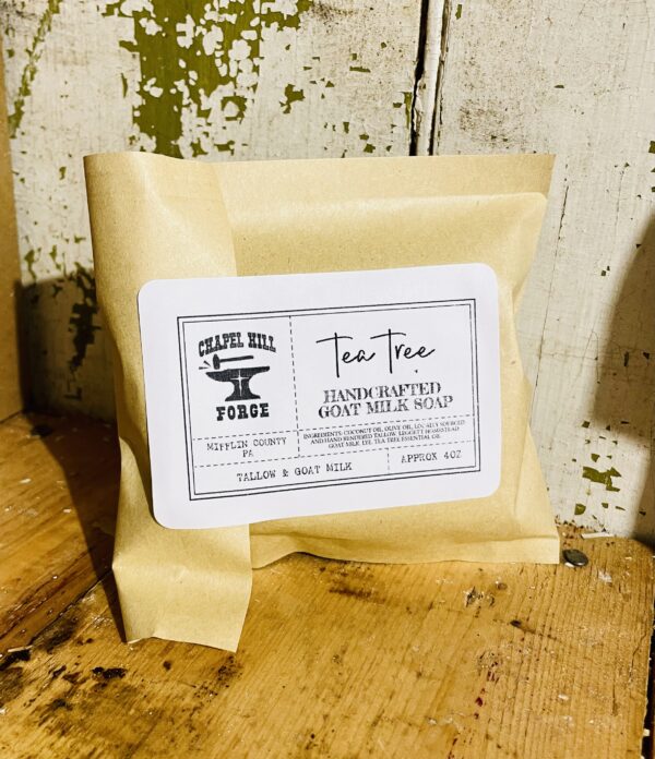 Acne soap with tea tree oil, goat milk, and tallow, ideal for blemish-prone skin.