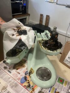 A skilled technician diligently repairing a KitchenAid Stand Mixer that's leaking oil. With expert hands and keen attention to detail, they address the issue, replacing worn-out parts, and replenishing the grease to restore the mixer's efficiency and prevent further leaks. #KitchenAidRepair #LeakingOilFix #SkilledTechnician #MixerRestoration